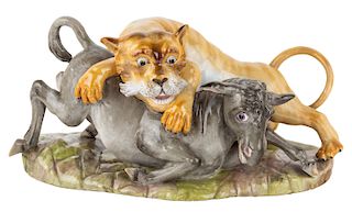 A RUSSIAN PORCELAIN GROUP OF A MOUNTAIN LION ATTACKING A DONKEY, EARLY 19TH CENTURY