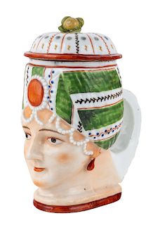 A RUSSIAN PORCELAIN FIGURAL MUG IN THE FORM OF AN OTTOMAN TURK WOMAN