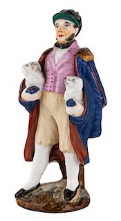 A RUSSIAN PORCELAIN FIGURE OF AN ENGLISHMAN WITH TWO DOGS, PRIVATE PORCELAIN FACTORY, MID-19TH CENTURY