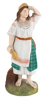 A RUSSIAN PORCELAIN FIGURE OF A UKRAINIAN WOMAN, FROM THE "PEOPLE OF RUSSIA" SERIES, GARDNER PORCELAIN FACTORY, MOSCOW, LATE 19TH CENTURY