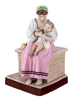 A RUSSIAN PORCELAIN FIGURE OF A WOMAN WITH A CHILD, GARDNER PORCELAIN FACTORY, MOSCOW, LATE 19TH CENTURY