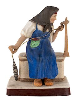 A RUSSIAN PORCELAIN FIGURE OF AN OLD WOMAN CARDING WOOL, GARDNER PORCELAIN FACTORY, MOSCOW, LATE 19TH CENTURY