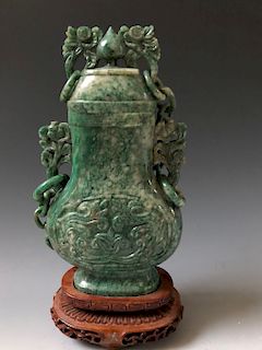 A CHINESE GREEN JADE CARVING 