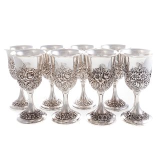 Set of 8 Kirk repousse sterling goblets