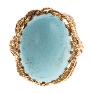 A Ladies Large Turquoise Ring in 14K