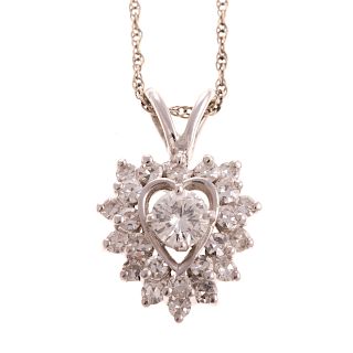 A Ladies 14K White Gold Diamond Heart Pendant