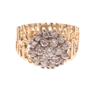 A Ladies Diamond Cluster Ring in 14K