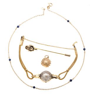 An Assortment of Ladies Gold Jewelry