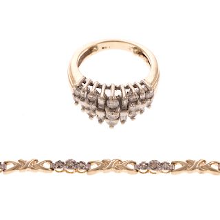 A Ladies Diamond Ring & Bracelet in Gold