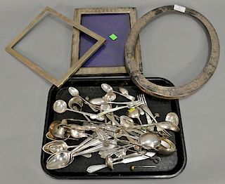 Sterling silver lot plus Portuguese silver spoons and three sterling silver frames (only one with back). 48.9 t oz. 
Provenance: Est...
