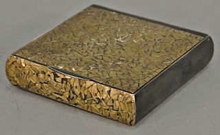 Silver and 18K gold hinged covered box, mounted with gold metal work top, front, and back. 3 1/2" x 3 1/2", 8.1 t oz. 
Provenance: E...