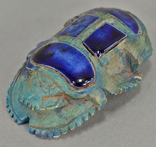 Cairo Museum, blue enameled stone scarab with onnig of Cairo Egyptian Museum Cairo Egypt tag on bottom. lg. 3 1/2 in. 
Provenance: E...