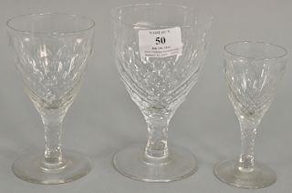 Set of crystal stems in three sizes, hand blown with ground bottoms including 8 red wine, 10 white wine, 16 brandy, and 2 cordials. ...