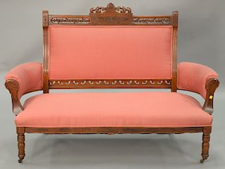 Two piece Eastlake Victorian set including gents chair and loveseat. ht. 61 in.