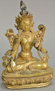 Gilt bronze guanyin seated figure on lotus form base. ht. 8 1/4 in.