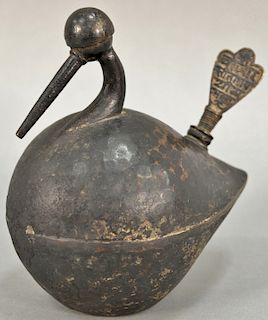 Bronze Persian or Eastern oil lamp, hand hammered bird form with script on plug cap. ht. 7 in. 
Provenance: Estate of Kenneth Jay Lane