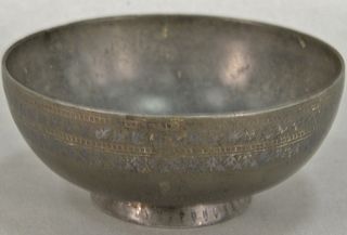 Early Persian iron bowl with silver inlay. ht. 2 1/4 in., dia. 5 in. 
Provenance: Estate of Kenneth Jay Lane