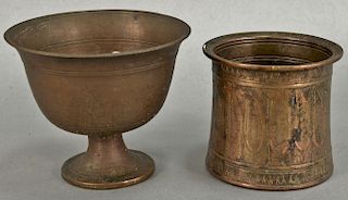 Two early copper cups, Eastern Islamic. ht. 3 1/4 in. & 3 3/4 in., dia. 3 1/4 in. & 4 1/2 in. 
Provenance: Estate of Kenneth Jay Lane