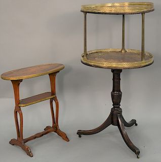 Two piece lot including George IV mahogany two tier revolving stand and oval stand. ht. 44 in., dia. 21 1/2 in. 
Provenance: Estate ...
