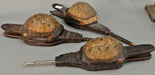 Three primitive turtle shell and leather bellows, lg. 20 1/2'', (one shell loose). 
Provenance: Estate of Kenneth Jay Lane