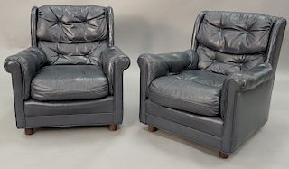 Pair of leather upholstered easy chairs. ht. 30 in.