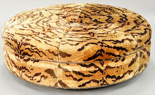 Scalamandre silk tiger print circular ottoman with button tufted and single welt detailing. ht. 13 1/2 in., dia. 43 in.  Provenanc...