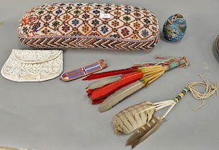 Beadwork group to include bolster pillow (tears one side) lg. 22 1/2 in., beaded handle feathers, egg purse, etc. 
Provenance: Estat...