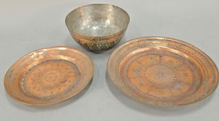 Group of fourteen antique copper pieces, hand hammered engraved Oriental, Persian plates, chargers, and a bowl. dia. 9 1/2 in. & dia...