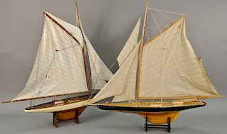 Two pond sailboat models. ht. 41 in., lg. 46 in.