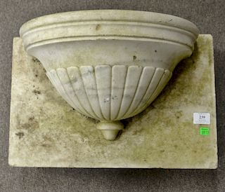 Carved marble font, 19th century demilune form with lobed base, lead fitting (losses to back edge of top, etc. wreathing throughout)...
