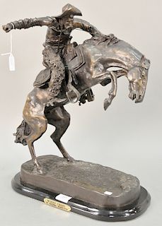 After Frederic Remington (1861-1909), bronze sculpture, "Woody Chaps", marked on base: Frederic Remington. ht. 21 in.
