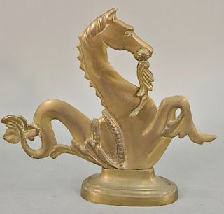 Heavy brass figural doorstop in the form of a seahorse. ht. 30 in., wd. 35 in. 
Provenance: Estate of Kenneth Jay Lane