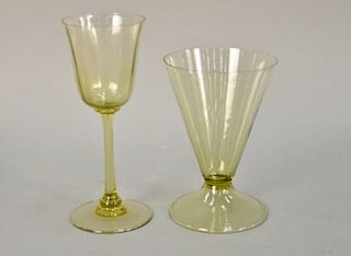 Set of sixteen green glasses. ht. 5 1/4 in. & 6 1/2 in.