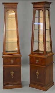 Pair of two part curio cabinets, signed Thomasville. ht. 81 in.