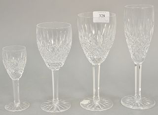 Sixty piece set of Waterford stems. 24 waters ht. 8 in., 12 wine ht. 7 in., 12 champagne ht. 8 1/2 in., and 12 cordials ht. 5 1/4 in.