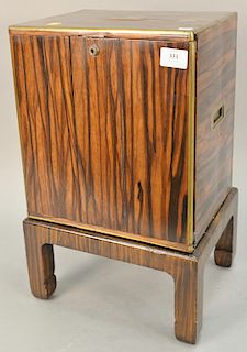 Calamander two door cabinet, brass edges on stand. 12" x 10" x 20"