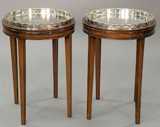 Pair of round top stands with silver plate inserts (one missing slide). ht. 24 in., top dia. 15 1/2 in.