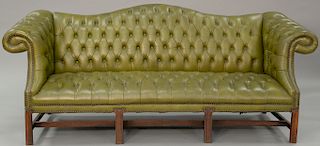 Leather tufted Chippendale style sofa. ht. 34 1/2 in., wd. 83 in.