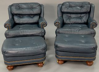 Pair of leather craft easy chairs and ottomans. ht. 34 in., wd. 34 in.