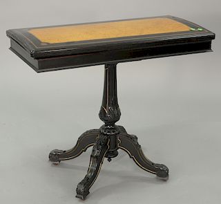 Classical game table, ebony and inlaid satinwood top opening to felt interior on carved pedestal base. ht. 29 in., top: 36" x 17"