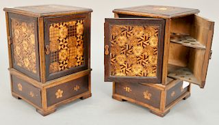 Pair of inlaid cigar boxes, each having four doors with fitted cigar holders (as is). ht. 9 1/2 in., wd. 6 1/2 in.