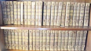 Five shelves of 105 books Oeuvres Completes DeVoltaire 71 volumes of leatherbound books 1823, Balzac 20 volumes, and Dickens Works 1...