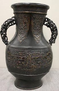 Asian Patinated Bronze Etched Urn with Handles.