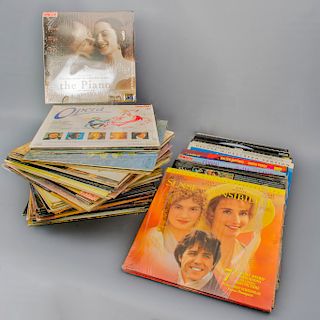 Colección de discos. LaserDisc y LP's. Diferentes películas y géneros musicales. Consta de: Michael Nyman. "The piano" , otros.