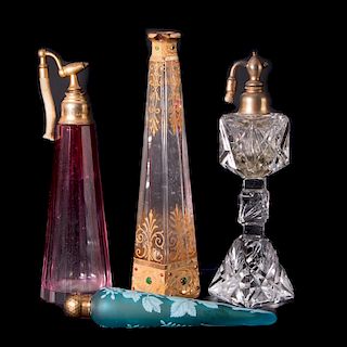 Four Perfume Bottles. Two of which are Atomizers.
