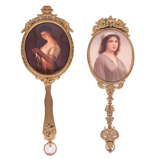Two Oval Portrait Hand Mirrors.