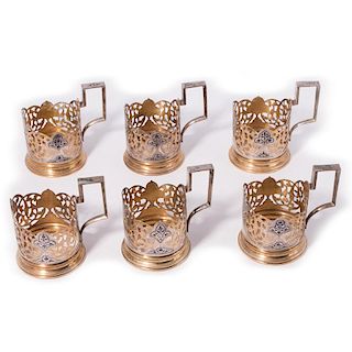 Six Silver and Gold Wash Glass Holders with Handles.