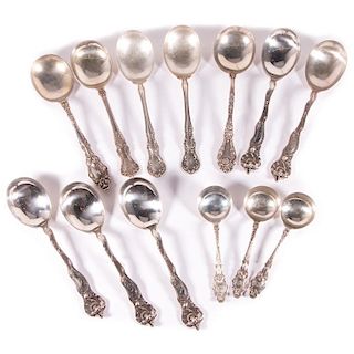 13 Sterling Soup Spoons. 20th. Century.