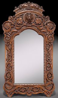 Large ornately carved wall mirror,
