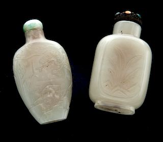 Two Chinese carved jade snuff bottles,